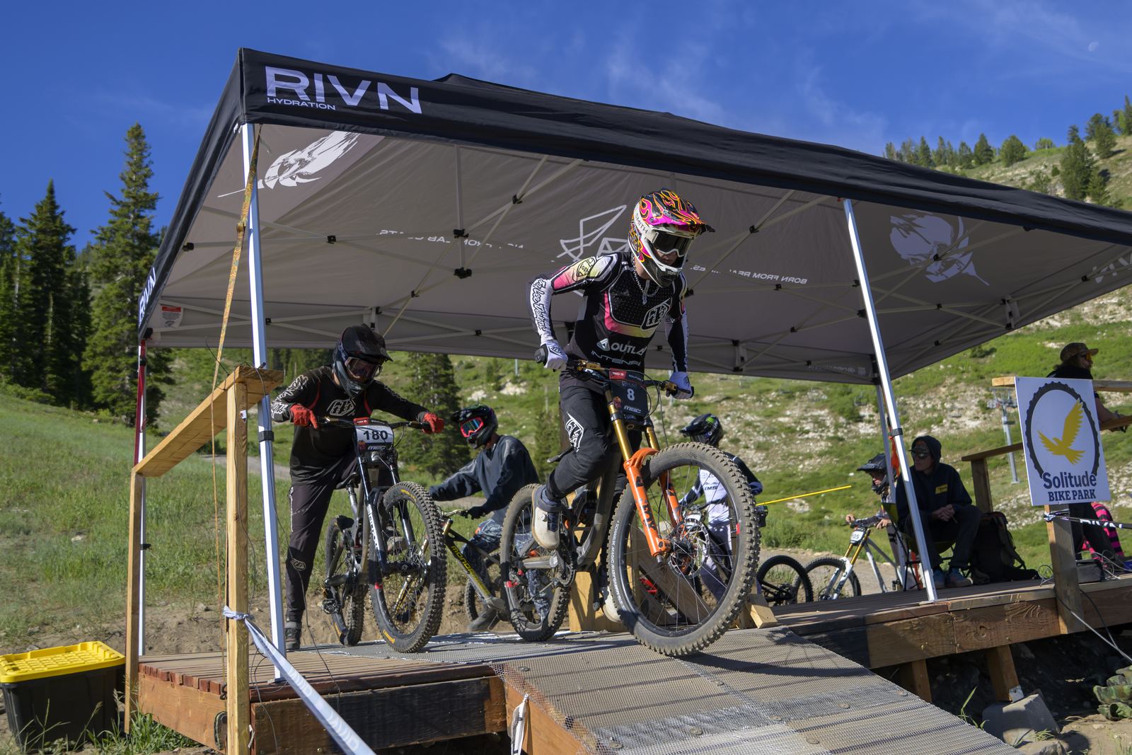 Fred in the start gate under a race tent at Solitude